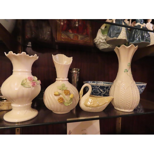 1125 - Four Pieces Belleek Two with Floral Detailing One Shamrock Motif Decorated Shaped Form Vase and Swan... 