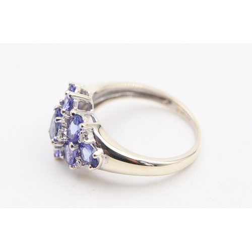 85 - Tanzanite Ladies Cluster Ring Mounted on 9 Carat White Gold Ring Size H and a Half