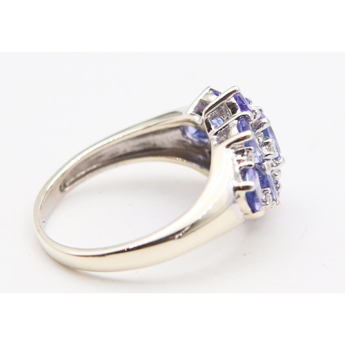 85 - Tanzanite Ladies Cluster Ring Mounted on 9 Carat White Gold Ring Size H and a Half