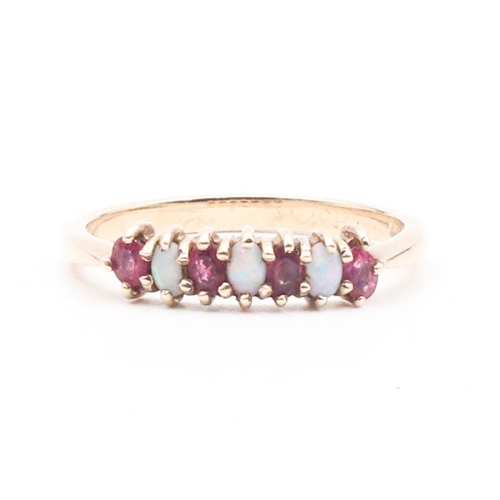 103 - 9 Carat Gold Garnet and Opal Ladies Ring Size O