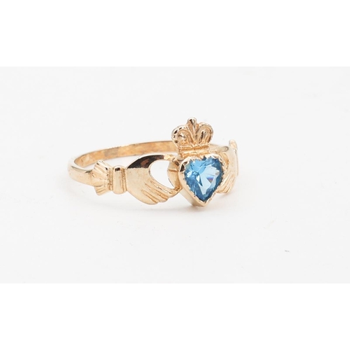 128 - Blue Topaz 9 Carat Yellow Gold Claddagh Ring Size Q and a Half