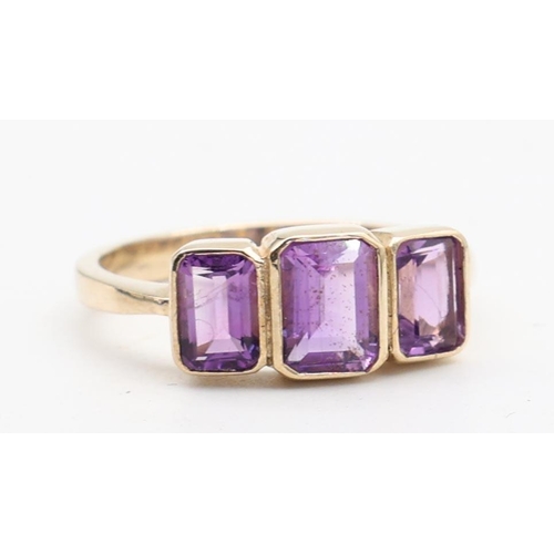 135 - Ladies 9 Carat Yellow Gold Three Stone Amethyst Ring Size O