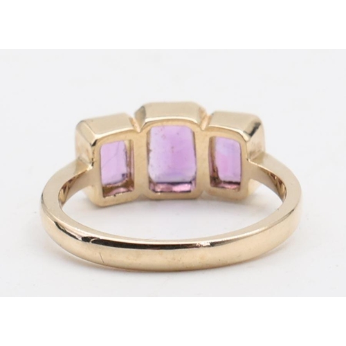 135 - Ladies 9 Carat Yellow Gold Three Stone Amethyst Ring Size O