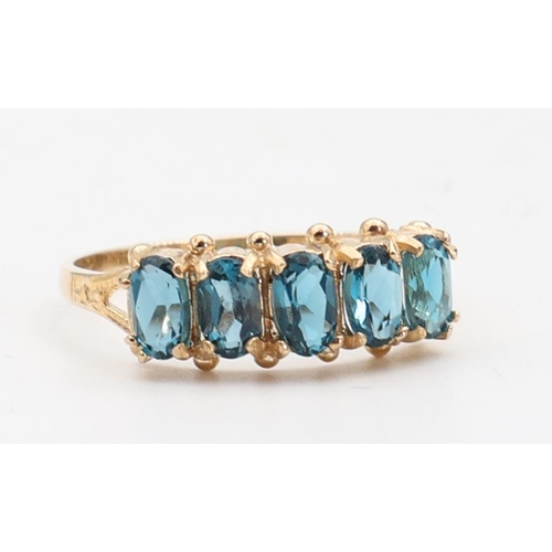 138 - Five Stone Ladies Blue Topaz Ring Mounted on 9 Carat Yellow Gold Ring Size O and a Half