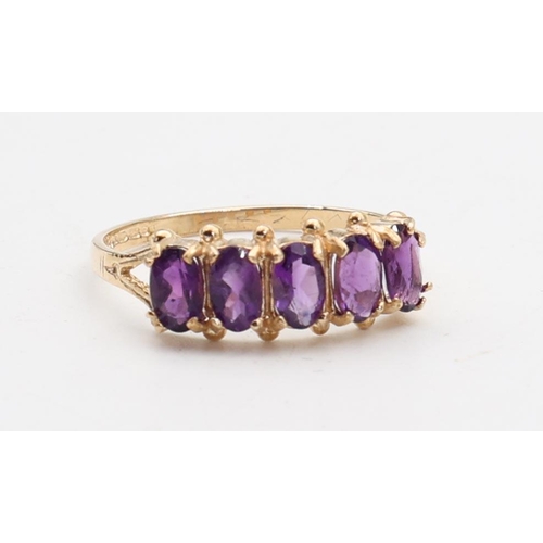 139 - Amethyst Set Ladies 9 Carat Yellow Gold Ring Five Stone Ring Size O and a Half