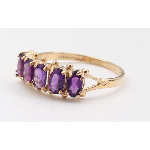 139 - Amethyst Set Ladies 9 Carat Yellow Gold Ring Five Stone Ring Size O and a Half