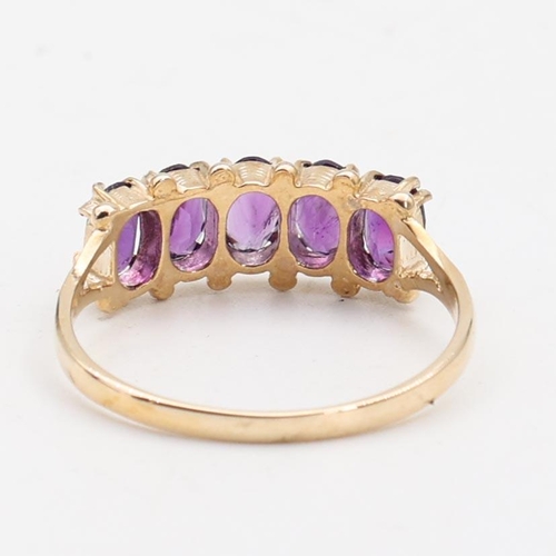 139 - Amethyst Set Ladies 9 Carat Yellow Gold Ring Five Stone Ring Size O and a Half