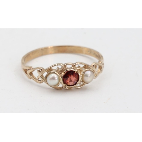 142 - Garnet and Pearl Set Ladies 9 Carat Yellow Gold Ring Size O and a Half