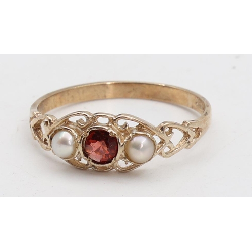 142 - Garnet and Pearl Set Ladies 9 Carat Yellow Gold Ring Size O and a Half