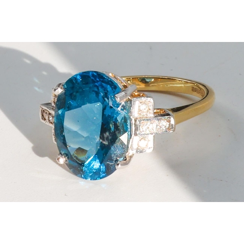 187 - Blue Topaz and Diamond Set Ladies Ring Mounted on 18 Carat Yellow Gold Ring Size O