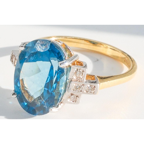 187 - Blue Topaz and Diamond Set Ladies Ring Mounted on 18 Carat Yellow Gold Ring Size O