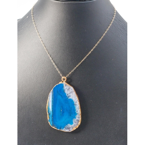 195 - Blue Agate Ladies Pendant Necklace Mounted on 9 Carat Yellow Gold Chain Attractively Stratified