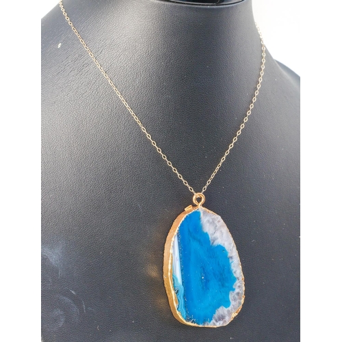 195 - Blue Agate Ladies Pendant Necklace Mounted on 9 Carat Yellow Gold Chain Attractively Stratified