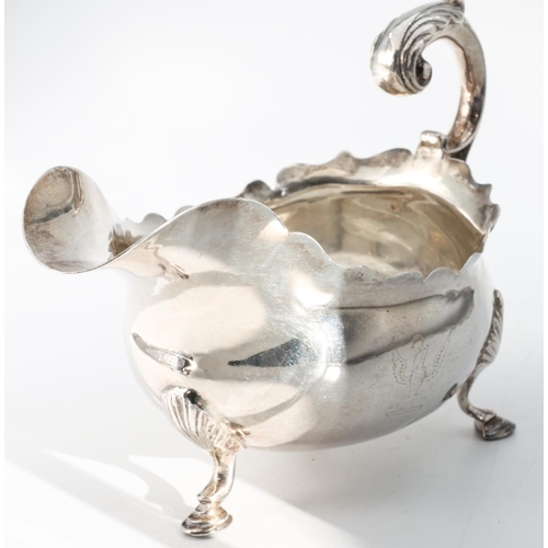 208 - Silver Sauceboat Shaped Form Handle above Well Formed Rim