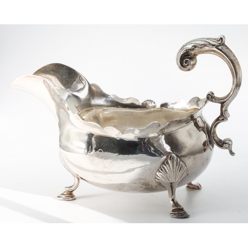 208 - Silver Sauceboat Shaped Form Handle above Well Formed Rim