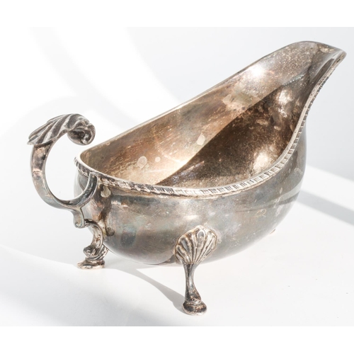 224 - Silver Sauceboat with Gadrooned Rim Decoration and Leaf Capped Flying Scroll Handle