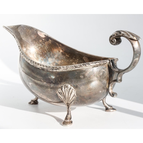 224 - Silver Sauceboat with Gadrooned Rim Decoration and Leaf Capped Flying Scroll Handle