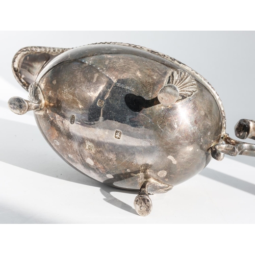 224 - Silver Sauceboat with Gadrooned Rim Decoration and Leaf Capped Flying Scroll Handle