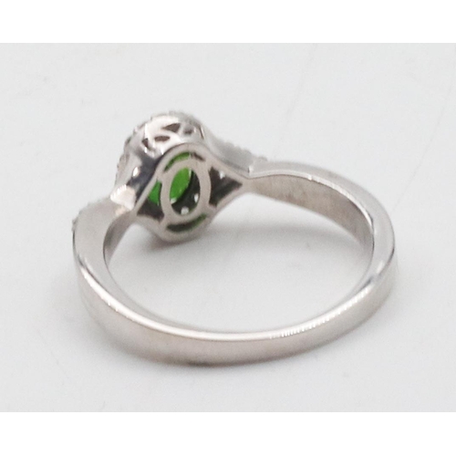 378 - Peridot Silver Mounted Ladies Ring Size S and a Half Approximately