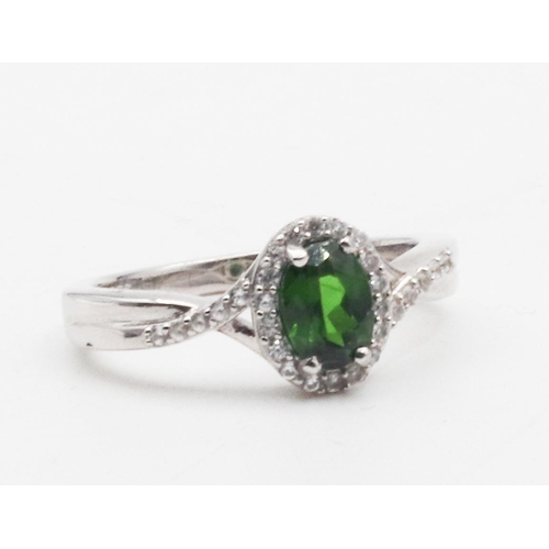 378 - Peridot Silver Mounted Ladies Ring Size S and a Half Approximately