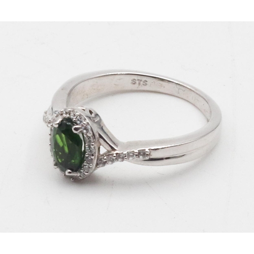 378 - Peridot Silver Mounted Ladies Ring Size S and a Half Approximately