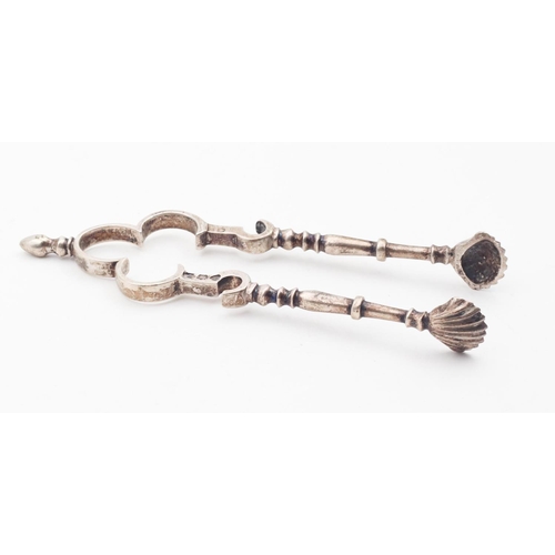 388 - Pair of Sugar Tongs with Scallop Motif Wells