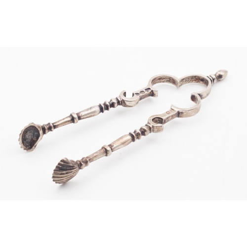 388 - Pair of Sugar Tongs with Scallop Motif Wells