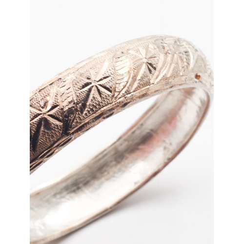 389 - Ladie's Silver Bangle Engraved Detailing