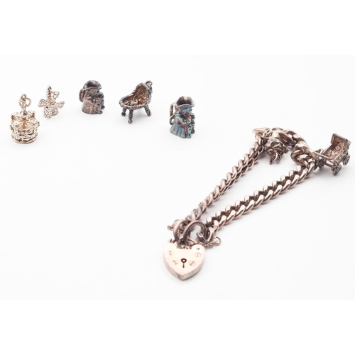 409 - Silver Charm Bracelet with Seven Charms