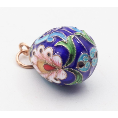 437 - Gold and Silver Enamel Decorated Egg Form Pendant Attractively Detailed