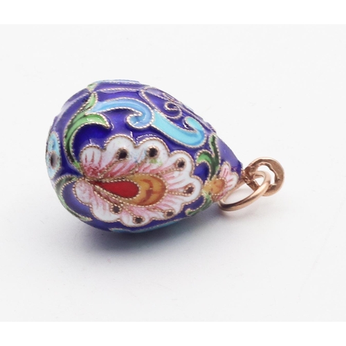 437 - Gold and Silver Enamel Decorated Egg Form Pendant Attractively Detailed