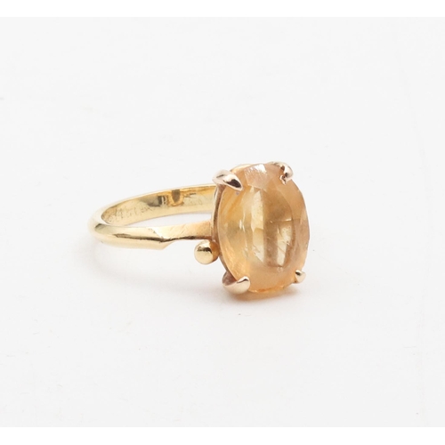 455 - Citrine Centre Stone Ladies Ring Mounted on 10 Carat Gold Band