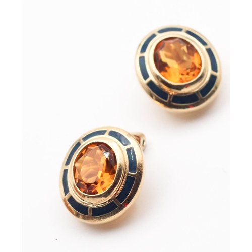 47 - Pair of Enamel Decorated Clip On Earrings by Burberry