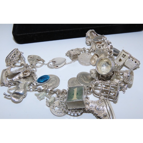 530 - Silver Charm Bracelet Laden with Numerous Charms Finely Detailed Good Weight