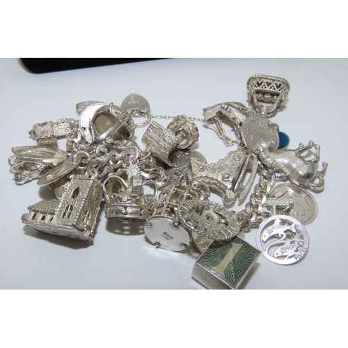 530 - Silver Charm Bracelet Laden with Numerous Charms Finely Detailed Good Weight