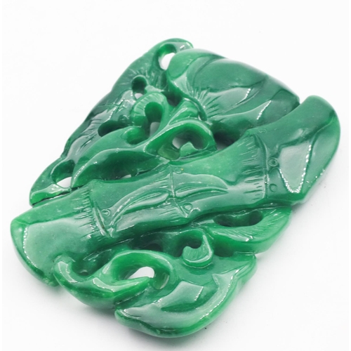 565 - Large Carved Jade Pierced Pendant