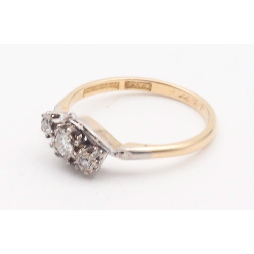 57 - Diamond Three Stone Crossover Ring Size O Mounted on 18 Carat Gold and Platinum Set