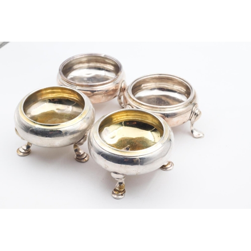 599 - Set of Four Georgian Silver Salts Circular Form Shaped Supports