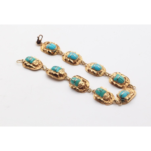 63 - Turquoise Scarab Motif Decorated Articulated Bracelet Mounted on 9 Carat Yellow Gold Length 21cm