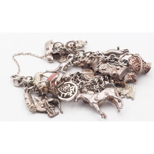 637 - Ladies Silver Charm Bracelet Laden with Numerous Charms