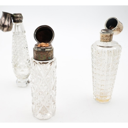 687 - Three Old Silver Mounted Cut Crystal Scent Bottles Tapering Form