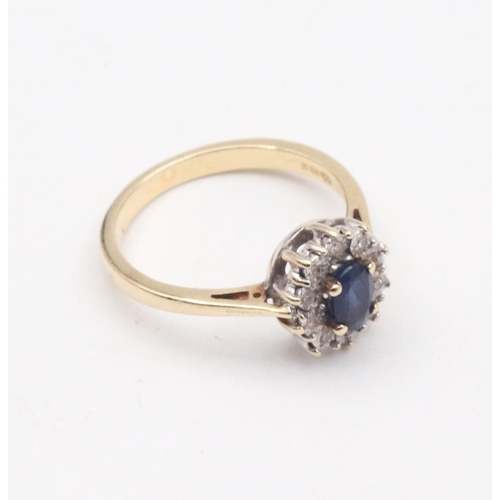 70 - 9 Carat Gold Sapphire and Diamond Cluster Ring Hallmarked London Ring Size O and a Half