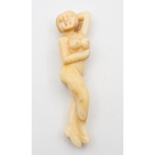 716 - Carved Bone Figure Scrimshaw Reclining Nude Approximately 4cm Wide