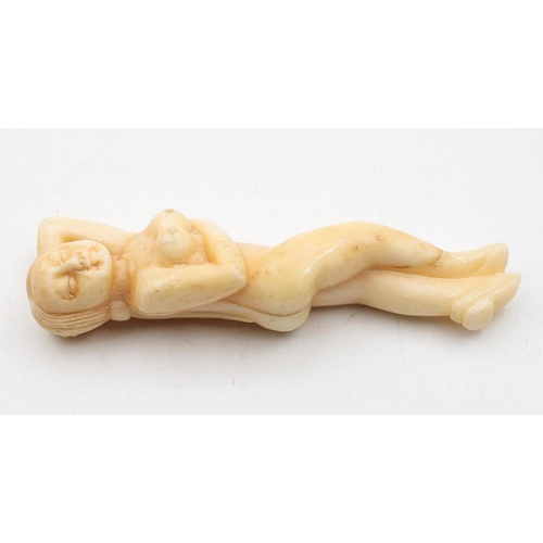 716 - Carved Bone Figure Scrimshaw Reclining Nude Approximately 4cm Wide