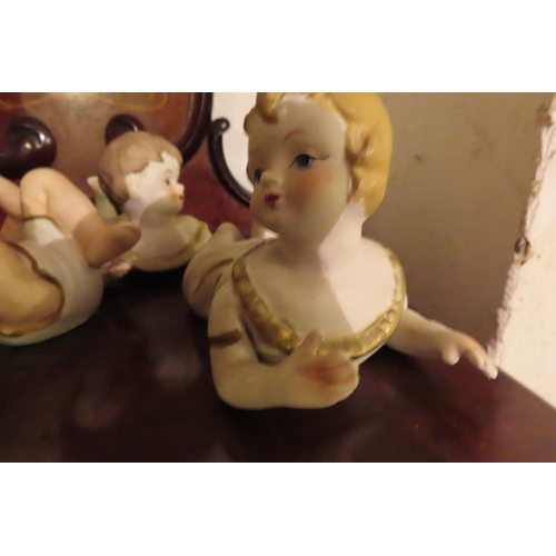 733 - Four Antique Bisqueware Figures