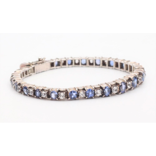 87 - Mid Twentieth Century Sapphire Bracelet Articulated Form Sapphires of Various Hues Length 18.5cm 24 ... 