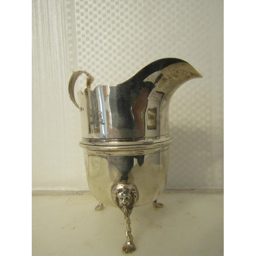 886 - Silver Cream Jug with Armorial Crest Flying C Shaped Handle and Lion Head Motif Decorated Supports A... 