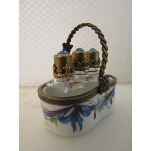 932 - Novelty Limoges Three Bottle Perfume Tantalus with Ormolu Mounts Gemset Tops to Crystal Bottles Attr... 