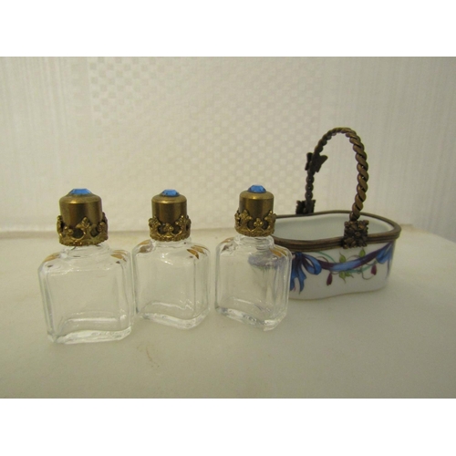 932 - Novelty Limoges Three Bottle Perfume Tantalus with Ormolu Mounts Gemset Tops to Crystal Bottles Attr... 