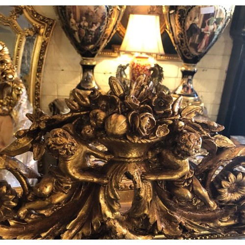 779 - Gilded Wall Mirror with Cherub Motif Upper Decoration Approximately 5ft 6 Inches High x 2ft 6 Inches... 